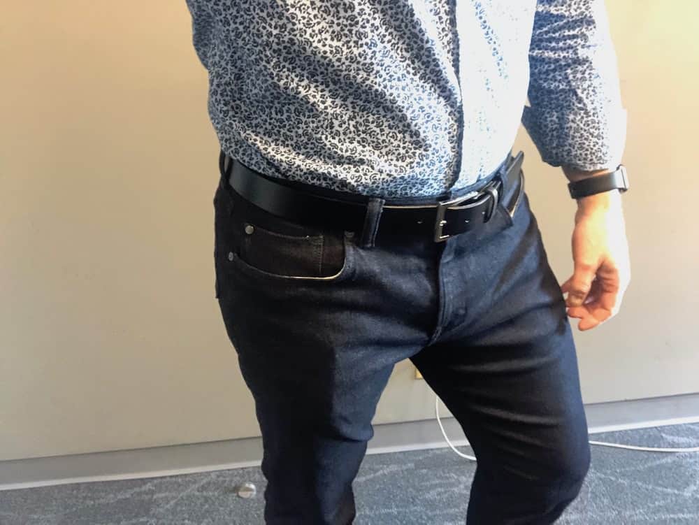 Front side view of dark blue Traveler jeans for men by Banana Republic